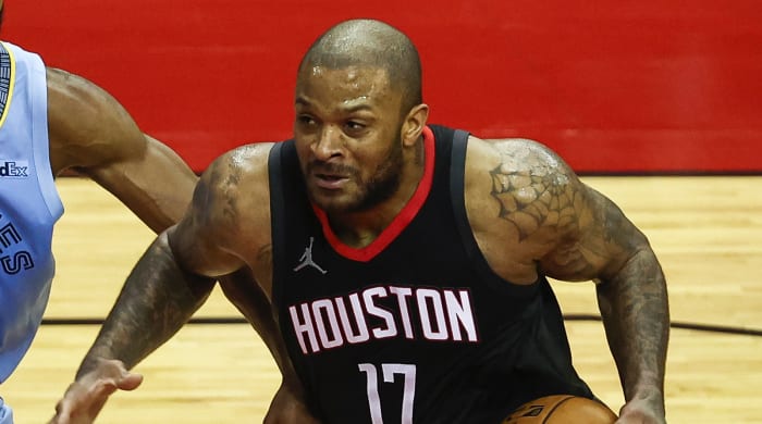 P.J. Tucker dribbles the ball